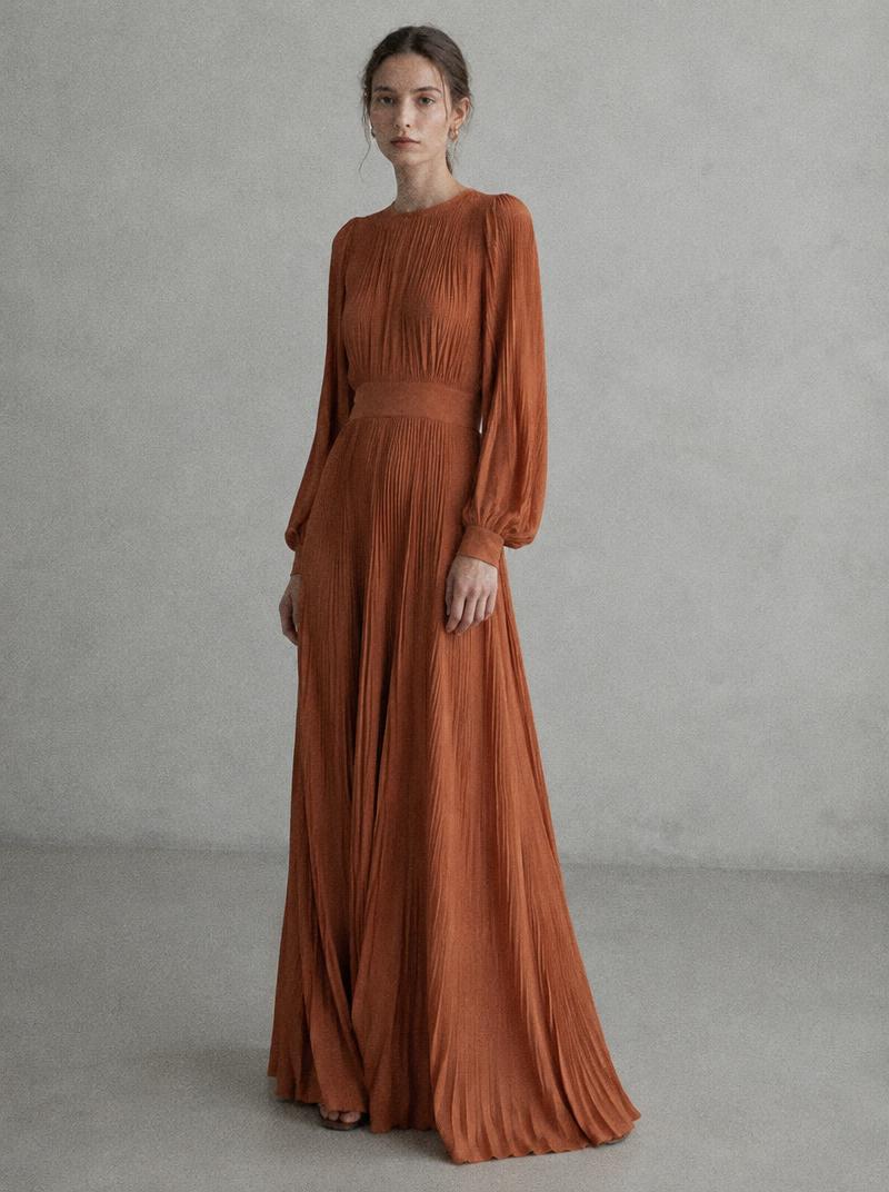 Odette Knit Dress — Soft ribbed knit with a flared hem.